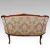 Pair of Edwardian walnut small sofas,10