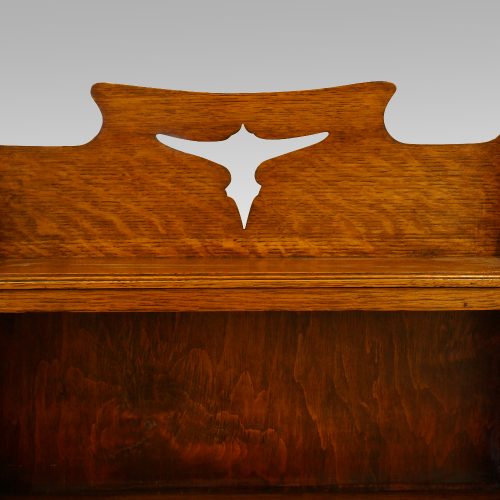 Arts and crafts open bookcase fretting