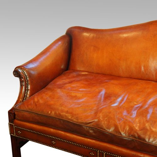 Edwardian mahogany camel back sofa arm