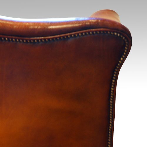 Edwardian mahogany camel back sofa back shoulder