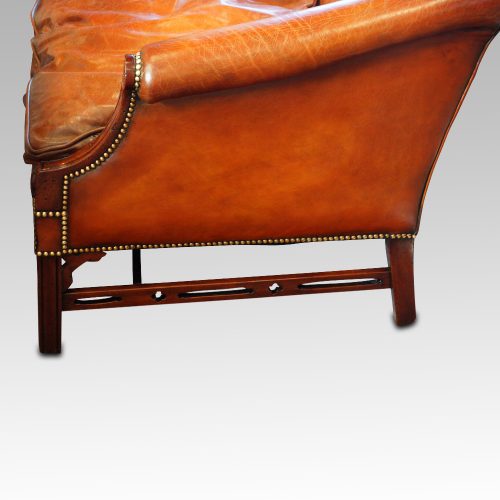 Edwardian mahogany camel back sofa end
