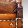 Edwardian mahogany camel back sofa leaf carving