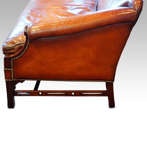 Edwardian mahogany camel back sofa side arm detail