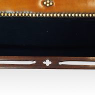 Edwardian mahogany camel back sofa under stretcher