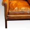 Georgian style leather wing chair arm