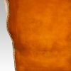 Georgian style leather wing chair back detail