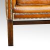 Georgian style leather wing chair leg
