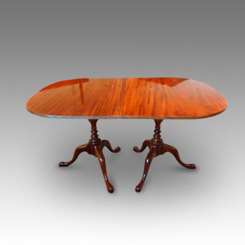 Georgian style mahogany twin pillar dining table closed