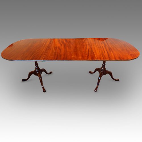 Georgian style mahogany twin pillar dining table side view