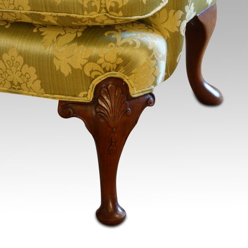 Queen Anne style wing chair leg