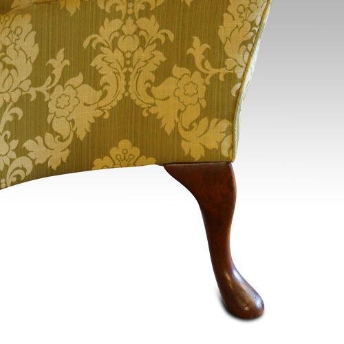 Queen Anne style wing chair back leg