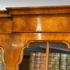 Walnut small breakfront bookcase door moulding