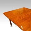 William IV mahogany extendng dining table corner
