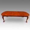 Edwardian mahogany claw and ball extending dining table