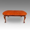 Edwardian mahogany claw and ball extending dining table closed side