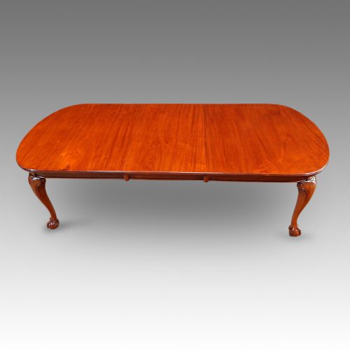 Edwardian mahogany claw and ball extending dining table side