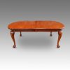 Edwardian mahogany claw and ball extending dining table side closed