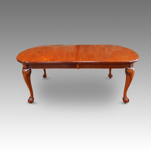 Edwardian mahogany claw and ball extending dining table side closed