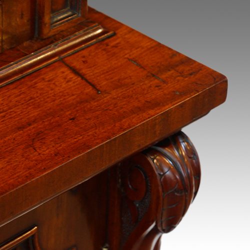 Fine Victorian mahogany bookcase top detail