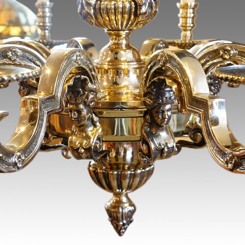Pair of bronze chandeliers central finial