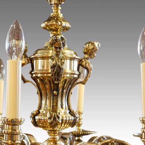 Pair of bronze chandeliers central pod