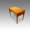 Edwardian inlaid mahogany writing table at angle