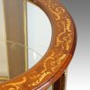 Edwardian mahogany circular bijouterie cabinet border