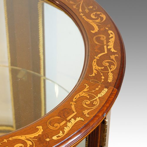 Edwardian mahogany circular bijouterie cabinet border