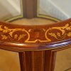 Edwardian mahogany circular bijouterie cabinet border detail