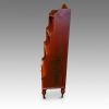 Pair painted waterfall bookcases side view