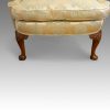 Queen Anne style wing-chair front legs