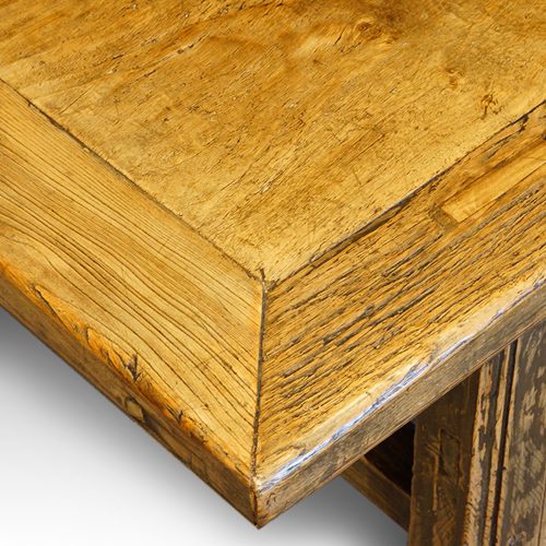 Antique elm coffee table corner