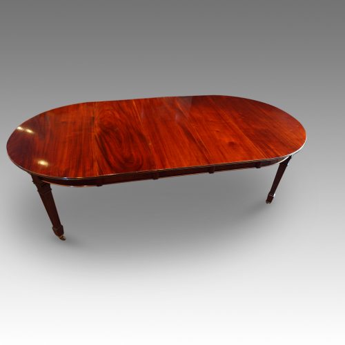 Edwardian extending mahogany dining table