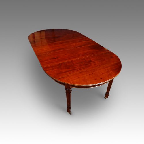Edwardian extending mahogany dining table end view