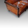 Edwardian mahogany leather sofa end