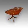 Regency style one leaf twin pillar dining table