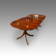 Regency style one leaf twin pillar dining table