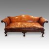 Edwardian camel back leather sofa