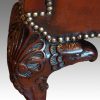 Edwardian camel back leather sofa knee