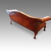 Edwardian camel back leather sofa rear