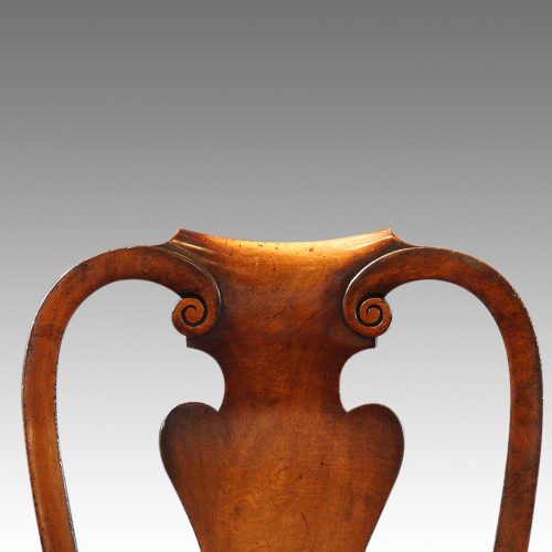 Pair of Walnut George I style armchairs detail top rail