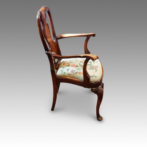 Pair of Walnut George I style armchairs side view