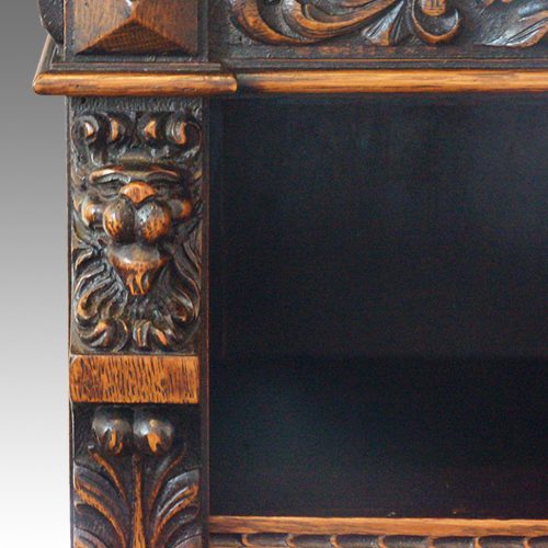 Victorian carved oak open bookcase lions head