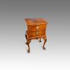 Pair of walnut bedside cabinets at angle