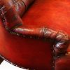 Victorian red leather club sofa arm