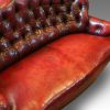 Victorian red leather club sofa seat