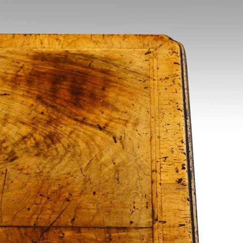 Antique walnut lowboy top detail
