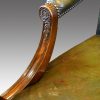 Leather revolving desk chair arm
