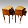 Pair of French bedside cabinets drawers open