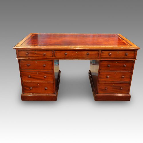 Victorian mahogany pedestal desk with bookcase to rear